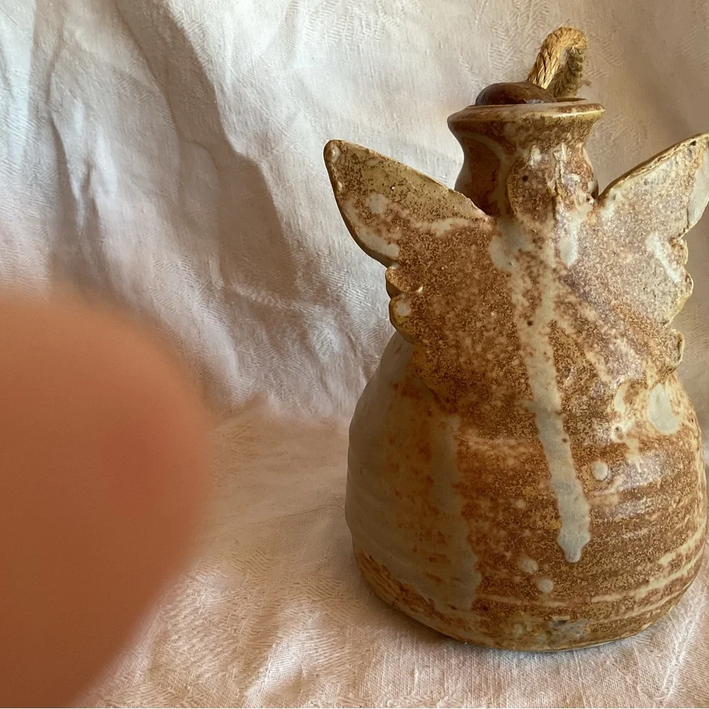 pottery angel oil lamp W/Original wick glazed in earthy brown tones Signed